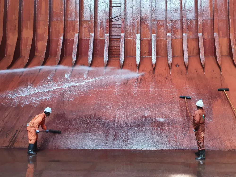 Hold walls being washed down under pressure